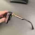 Chrome Hearts black and gold glasses